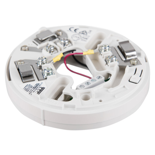 angled view of the hochiki esp short circuit isolator base showing wiring terminals and mounting features