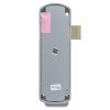 Back view of exidor single door push pad latch showing its grey metal body with labels and latch bolt protruding