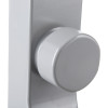 Closeup of the exidor outside access device knob showing a smooth, round silver surface attached to a rectangular base