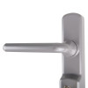 Silver lever-style door handle mounted on a rectangular backplate, with part of a keyhole visible below the handle