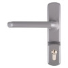 Straight silver door handle on a rectangular backplate with a visible keyhole near the bottom