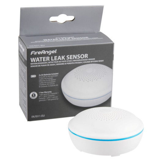 A FireAngel water leak sensor placed in front of its retail packaging, which displays the product name and multilingual descriptions.