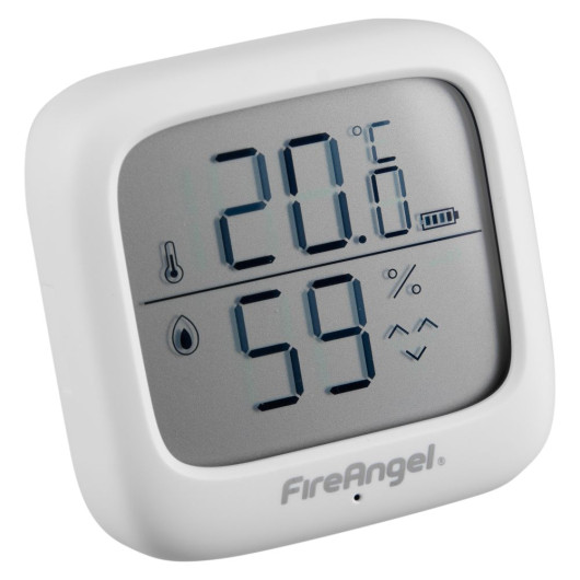 A FireAngel temperature and humidity sensor showing 20.6°C and 59% on its LCD display