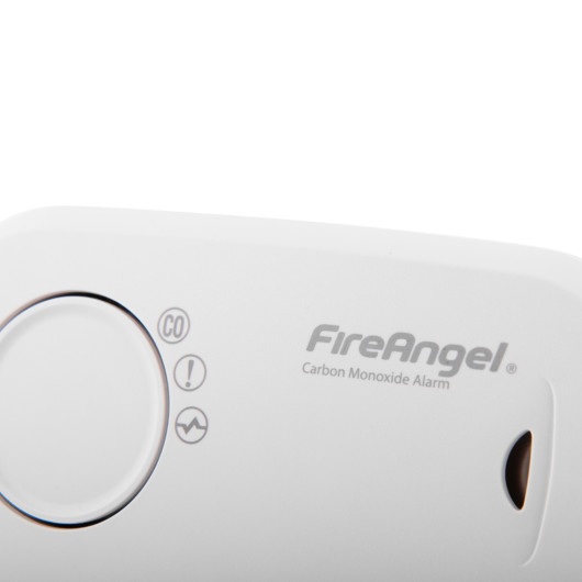 Close-up detail of the FireAngel carbon monoxide alarm 10yr led showing the test button and logo