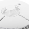 Close-up detail of the FireAngel heat alarm 10yr long life battery showing the central sensor and test button text
