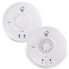 Two round white FireAngel alarms, one smoke and one heat model, each with front‑facing LED indicators and test buttons.