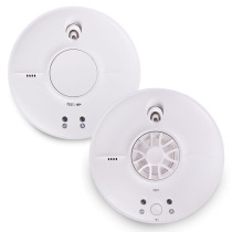 Two round white FireAngel alarms, one smoke and one heat model, each with front‑facing LED indicators and test buttons.