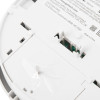 Closeup of the back of a fireangel mains powered heat alarm alkaline backup showing connection ports and label information