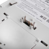 connector pins on the back of a fireangel mains powered heat alarm alkaline battery backup