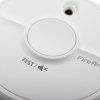 Close up of the test button on a fireangel battery optical smoke alarm
