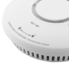 Close up detail of the FireAngel combination optical smoke carbon monoxide alarm showing test button and warning label
