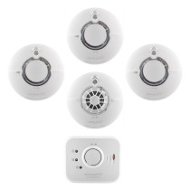 image featuring three white smoke alarms, one white heat alarm with visible sensor grille, and one carbon monoxide alarm, displayed on a white background