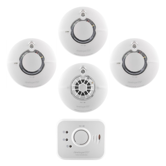 image featuring three white smoke alarms, one white heat alarm with visible sensor grille, and one carbon monoxide alarm, displayed on a white background