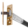 angled close up of an astra 3003 series concealed fire door closer showing mounting plates and label details