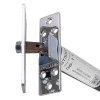 Close-up angled view of the astra 3003 series concealed fire door closer showing metal components and label