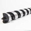 Close-up of an angled drill bit included in the astra 3000 series installation kit with a black and silver spiral design