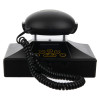 Front view of the deafgard bedside fire alarm monitor showing the handset resting on the base with coiled cord attached