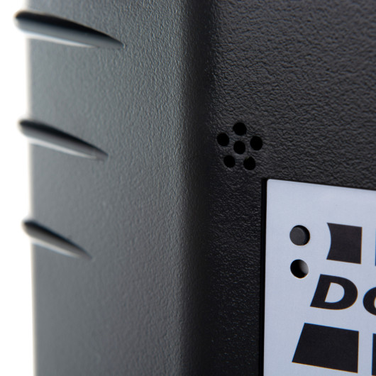 Closeup of the sounder part of the dorgard fire door retainer black showing textured surface and small holes