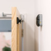 fireco dormag pro magnetic door holder showing the holder and plate in situ with the door released from the magnet