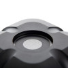 Closeup front view of the dormag smartsound fire door holder showing its circular centre and textured surface