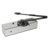 freedor smartsound door closer top shown at an angled view with arm extended and metal casing visible