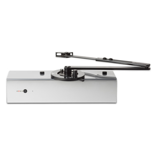 freedor smartsound door closer shown from the front top with a metal body and extending arm