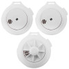 Close-up of three white mains powered 2 smoke 1 heat alarms Firehawk kit group devices showing their front and back details