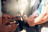 A group of people with their phones in a circle