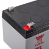 Closeup of the 12v battery fire alarm panel psu showing the top corner with terminals and part of the label