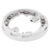 angled view of the apollo alarm base showing its circular white frame and internal metal components