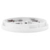 Side view of the apollo alarm base showing its round shape and internal components