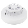 angled close-up of an apollo discovery heat detector showing its round white casing and vented top design