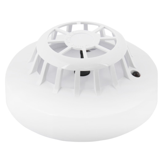 Angled view of an apollo xp95 class a2s heat detector showing the white circular casing and grille design