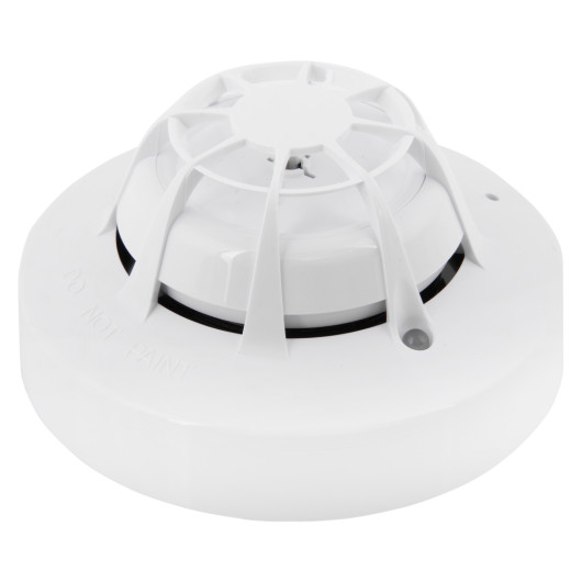 angled view of the apollo xp95 multi sensor detector showing its white circular design with grille details