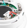 Closeup of the alarmsense sounder base showing wiring terminals and internal components in white casing