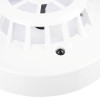 Closeup of the white Flash55 Apollo Alarmsense 55 Deg Rate Of Rise Heat Detector showing its sensor and grille design