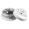 alarmsense a1r rate of rise heat detector with its cover removed showing internal components separated on a white background