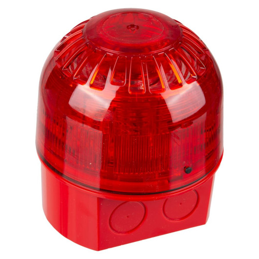 Angled view of a red Apollo AlarmSense open-area sounder beacon with a transparent red lens, mounted on a red base with cable entry knockouts visible on the side.