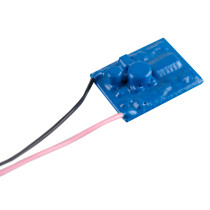 kentec line continuity monitoring unit shown as a small blue rectangular device with two thin attached wires