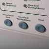 Closeup of buttons labelled Silence Sound Alarm, Alarm Fault Warning Silence and Reset on kentec sigma cpr 4 zone repeater panel