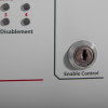 Closeup of keyhole on kentec sigma cpr 4 zone repeater panel showing enable control text