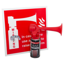Front view of an air horn with a red warning sign showing a horn and text next to it