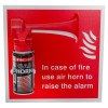 Red air horn with a sign clipped in that shows fire safety instructions on a red background