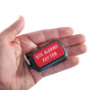 evacuator synergy rf key fob held in an open hand showing the front label with site alarms key fob text