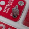 Closeup of key inserted into the evacuator synergy rf base station site alarm showing on off switch markings