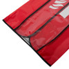 Close-up of the bottom of a red fire extinguisher cover with black trim and a clear plastic window