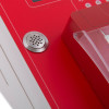 Close up of the speaker on the evacuator synergy plus wireless site alarm base station in red and white housing