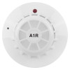 Part of the evacuator synergy+ wireless site alarm automatic heat detector showing a round white detector with a red indicator light