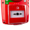 Closeup of Fmcsynptg Evacuator Synergy Wireless Tg Extra Tough Call Point Site Alarm Sounder Strobe showing red casing and clear shield