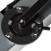 A close‑up of a mechanical adjustment dial with four numbered positions (1–4), each marked with plus and minus symbols, and a small black lever arm.